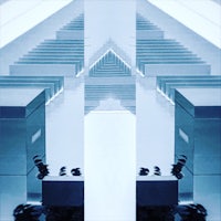 a photo of a building with stairs in the background