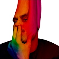 a man with a rainbow colored head